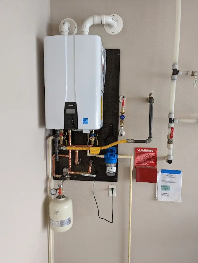 Professional plumber installing copper piping in a Sugarmill Woods home